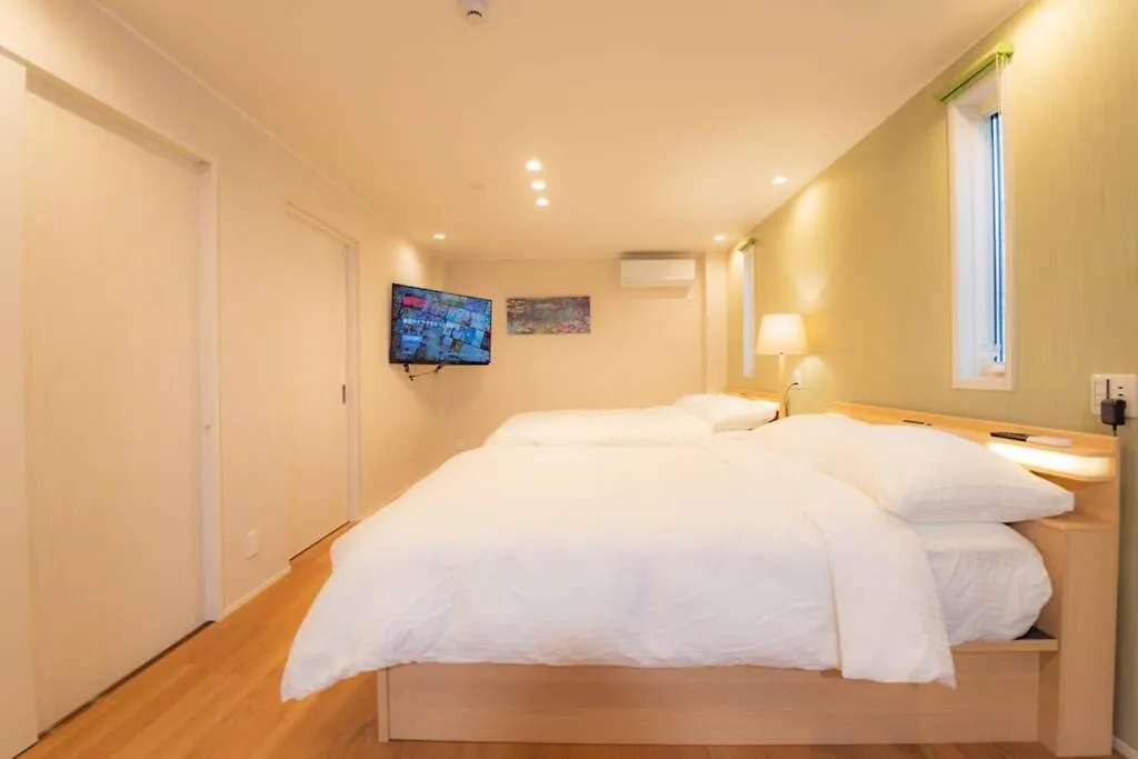 M Hotel Apartmán